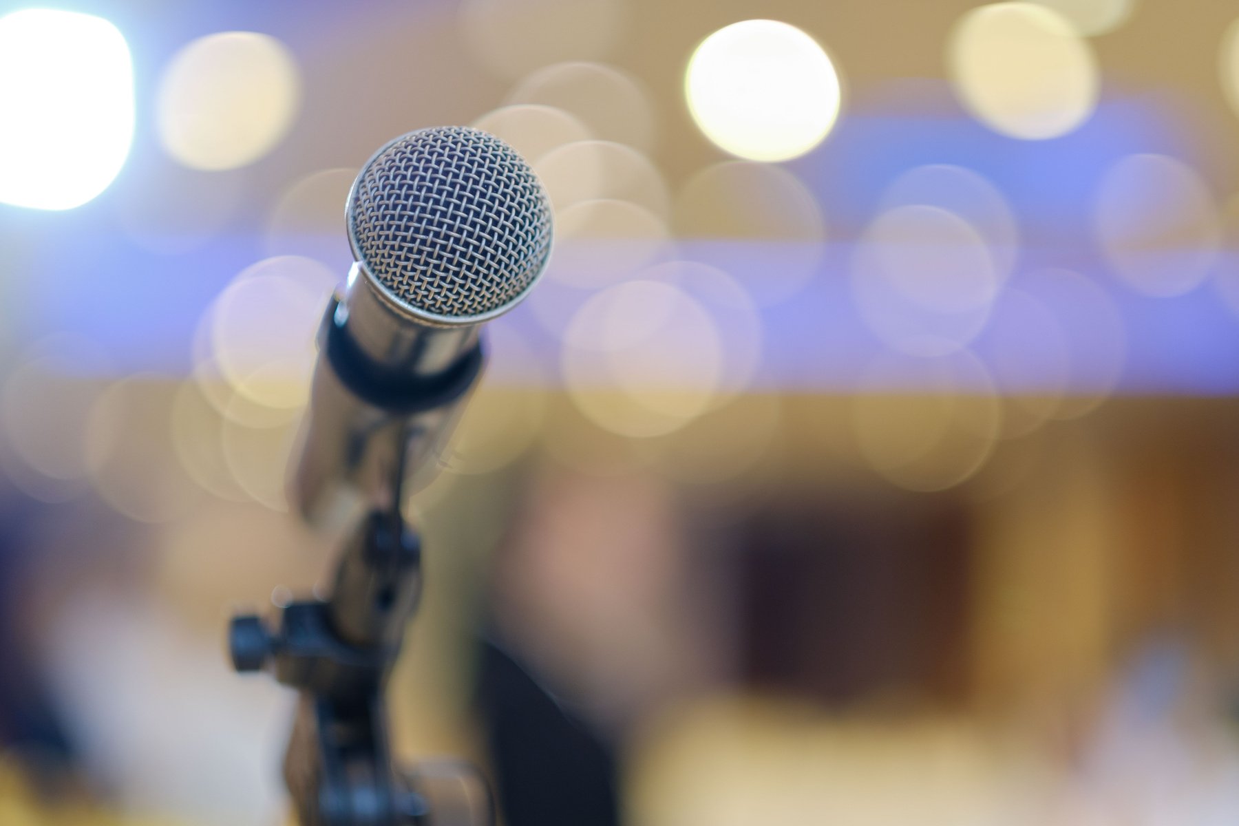 microphone on stage, speaker, conference